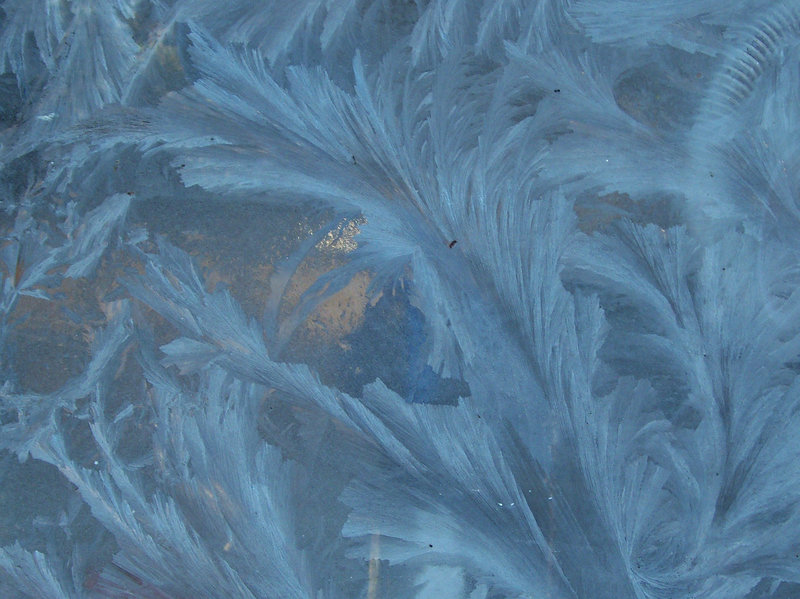 More intricate ice patterns on the glass