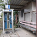 Banc et téléphone publique / Phone booth and long bench.