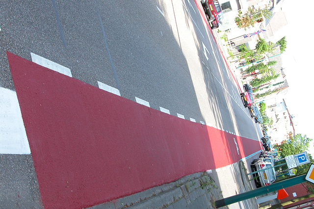 Fancy new red paint on the cycle lane on the way home