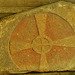 holy trinity, bottisham,large cross relief, with original colour, most probably an early c12 tympanum from over a norman doorway. it is now in the collection of unusual carved stones in the north aisle.
