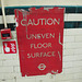 Caution uneven floor surface