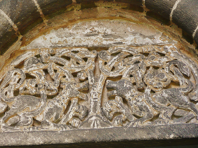 wordwell church suff. mid c12 south doorway tympanum, with dog like lions either side of a tree