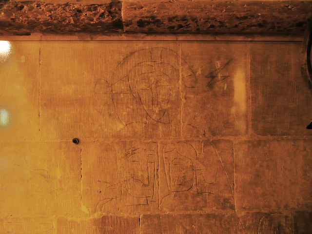 rochester cathedral graffiti,emmaus graffiti incised into northern crypt pier, early c12, similar to that opposite it in showing christ above two figures and a chalice and hand holding a host at each 