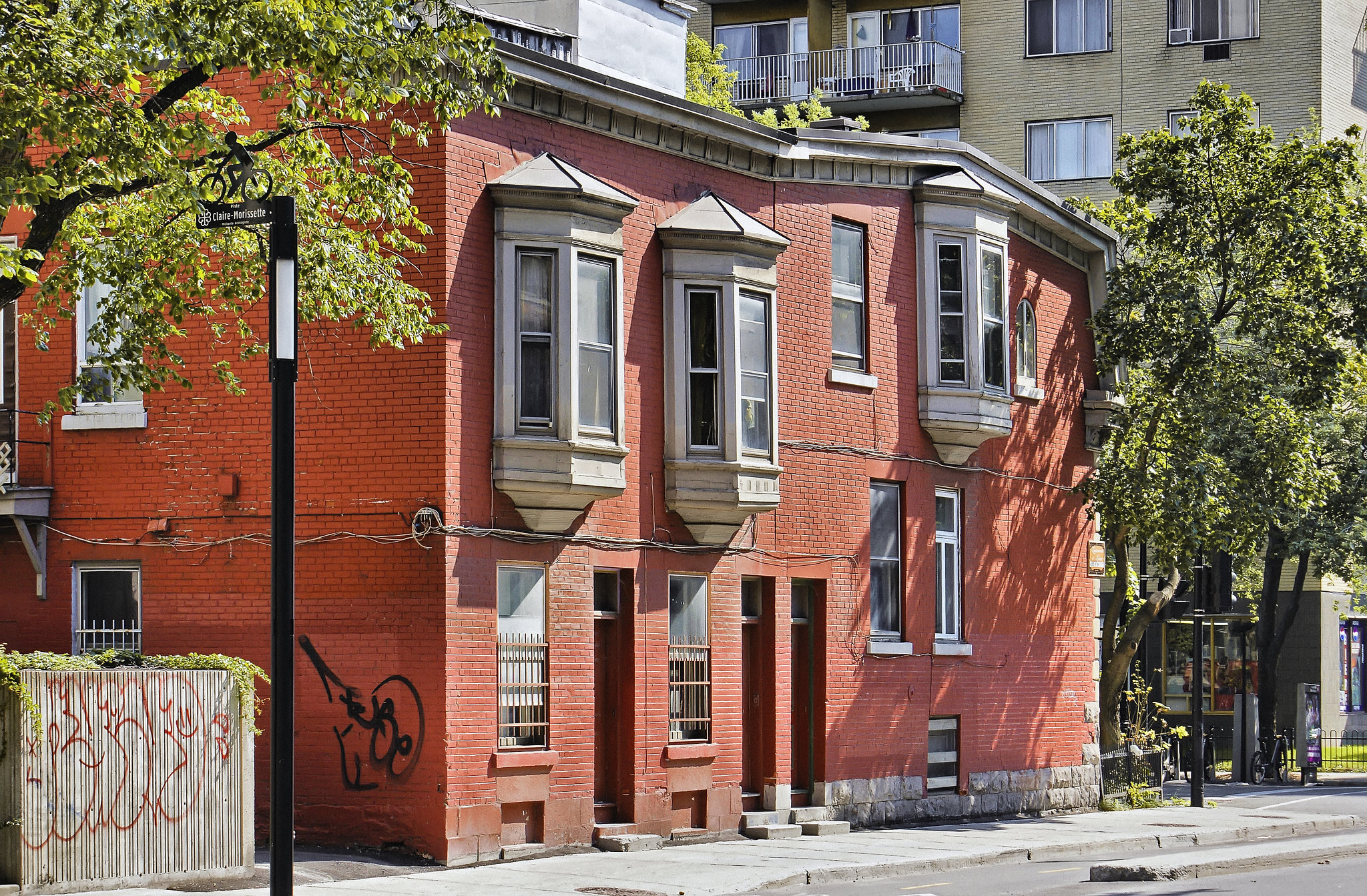 Three Bay Windows and a Bike Path – de Maisonneuve near Fort Street, Montréal, Québec