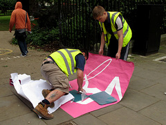 Sticking down the signage