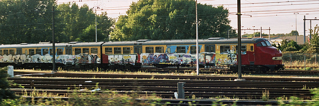 Trains in three colours: Red, Yellow and Graffiti