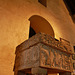 burnham deepdale church, norfolk,the c12 font stands before the c11 saxon tower arch below the triangular headed gallery door