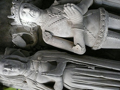 ely cathedral,tomb of john tiptoft, humanist earl of worcester and his two wives philippa and joyce. he died in 1470, beheaded. his over restored effigy sports the ss livery collar of the lancastrians