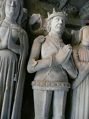 john of worcester, ely cathedral,tomb of john tiptoft, humanist earl of worcester and his two wives philippa and joyce. he died in 1470, beheaded. his over restored effigy sports the ss collar of the lancastrians