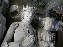 ely cathedral,tomb of john tiptoft, humanist earl of worcester and his two wives philippa and joyce. he died in 1470, beheaded. his over restored effigy sports the ss collar of the lancastrians