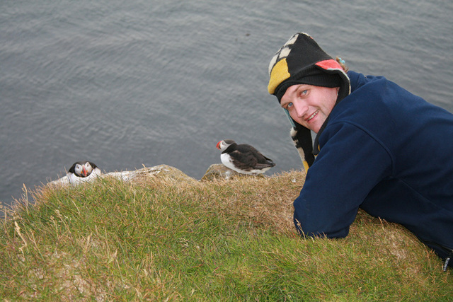 Richard checks out the puffins at the cliffs edge