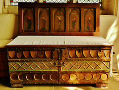 newport church, essex,this c13 chest with its lid painted inside as a reredos seems to have been a portable altar of some sort, despite the rulings against wooden rather than stone altars. it seems to date from c.1280 or so, but has been restored and re-l