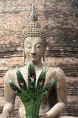 Buddha with offering
