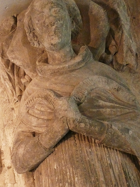 st.mary's church, luton,monument to william wenlock, master of the farley hospital in luton, who died in 1392. note the prayer scroll and crenellations around the tomb chest, both uncommon designs.