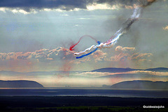 Red Arrows Painting the Moray skies with the Cromarty Gap, behind, in partial mist