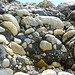 Nerja  y sus grandes rocas formadas de piedras pequeñas