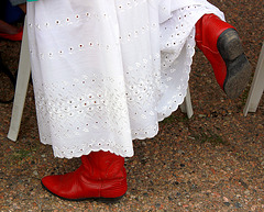 Cowboy boots and dotted swiss