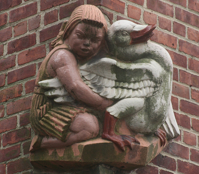 Young Girl Hugging a Duck