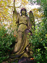 brompton cemetery, earls court,  london,early c20 angel by cemetery gates
