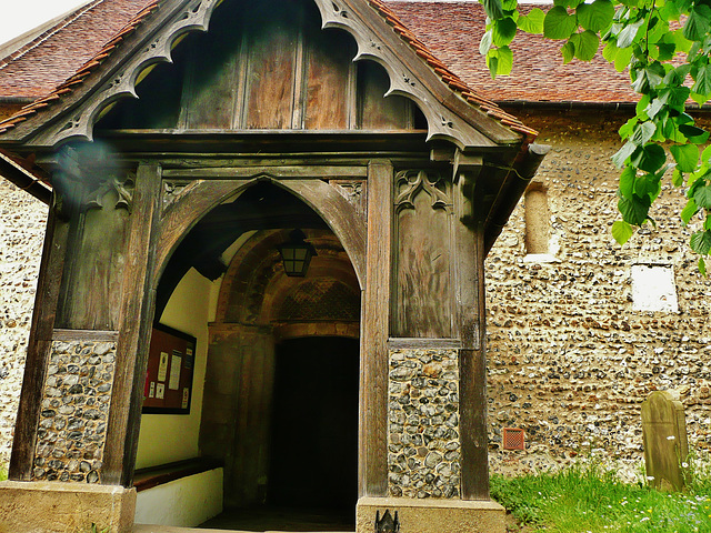 st.giles church, orsett, essex ,c12 doorway and nave wal,l, with a blocked window, and what is obviously norman coursing