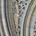 peterborough cathedral,the doorway to peterborough's refectory to the south of the cloister is very ornate, with dragons in the stiffleaf of its tympanum. it dates from the early mid c13.