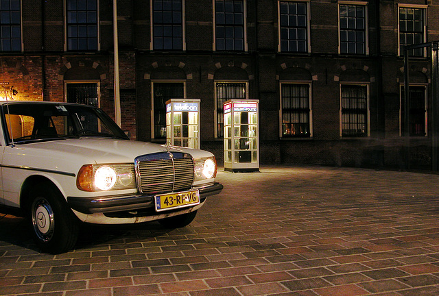 My car and some old telephone boxes