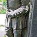 brompton cemetery, london,detail of one of the decapitated thames watermen, who wear doggett's coat and badge, from the tomb of champion oarsman robert coombes, 1808-60