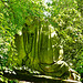 abney park cemetery, stoke newington, london,this kneeling figure may be on the tomb of harriet delph , 1944,  buried in the undergrowth like so many here