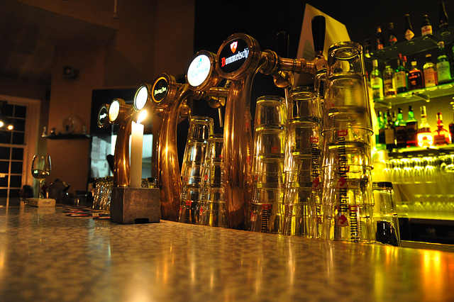 Beer pumps and beer glasses