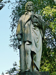 abney park cemetery, stoke newington, london,statue to dr.watts, the writer of hymns who lived with the family who owned the house here, made by baily in 1845. it is sited on his favourite walk in the gardens