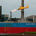 Flame, helicopter and ship