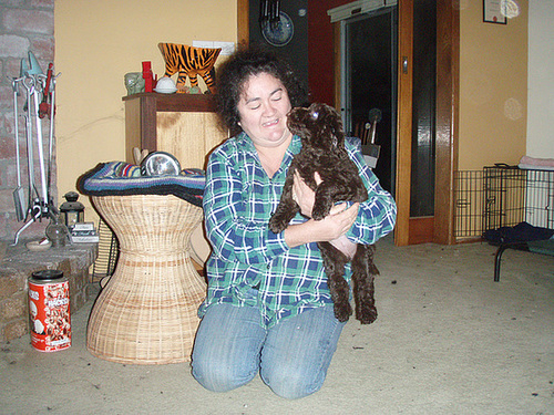 Sandy and puppy have fun