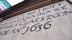 Lettering over the entrance of Saint Salvator's almshouse in Leiden