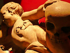 all hallows barking, london,cherub with skull from an c18 tomb, now in the crypt