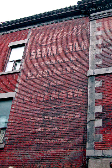 Faded wall ad in Montreal, Quebec