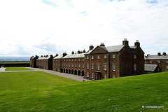 The Highlanders Museum in the foreground, in front of a massive parade ground.