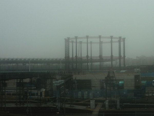 Gasometer in the fog