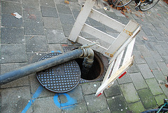 A open manhole – manhole cover of TBS