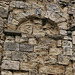 st.mary, sandwich,this small battered early c12 tympanum seems to have been that to the stair leading to the central tower, which fell in 1668. it is now high in the west front.