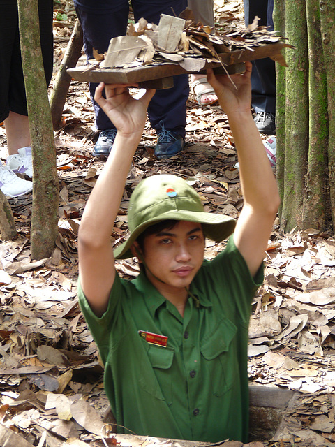 Demonstrating Viet Cong Concealment Techniques