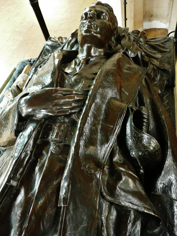 all hallows barking, london, c20 effigy by cecil thomas, 1923, of alfred forster, as a war memorial for all the ww1 dead. the sword by his side shows that a romantic idea of death in battle still lingered, even after the trenches.