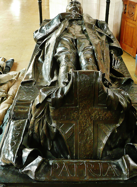 all hallows barking, london, effigy by cecil thomas, 1923, of alfred forster, as a war memorial for all the ww1 dead. the sword by his side shows that a romantic idea of death in battle still lingered