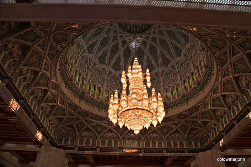Main chandelier and ceiling detail in the Sultan Qaboos Mosque