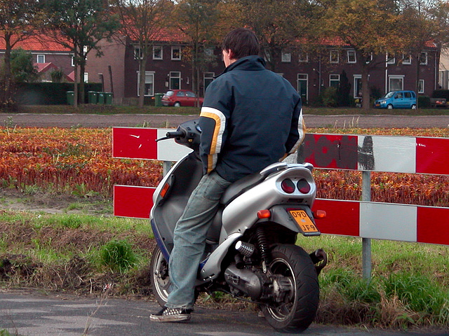 Boy on moped