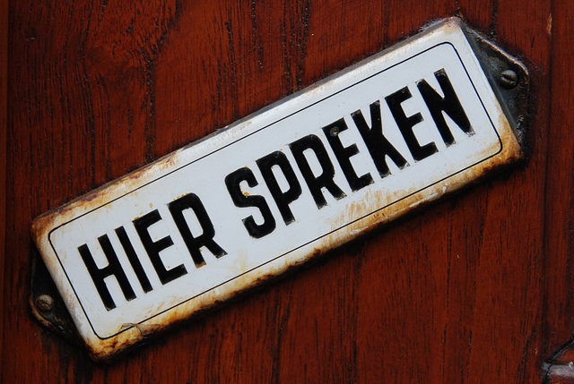 Enamel signs: Speak here