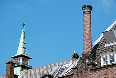 Things on rooftops: Little green tower and chimney