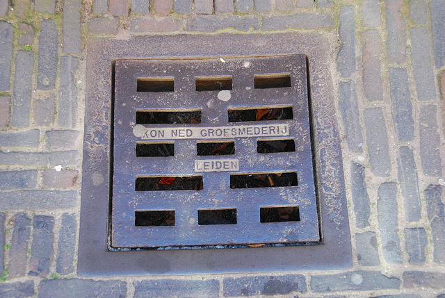 Sewer cover of the Koninklijke Nederlandse Grofsmederij