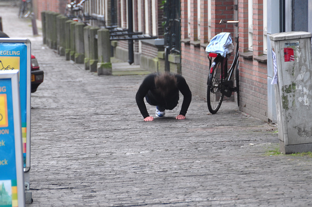 Doing push-ups on the street