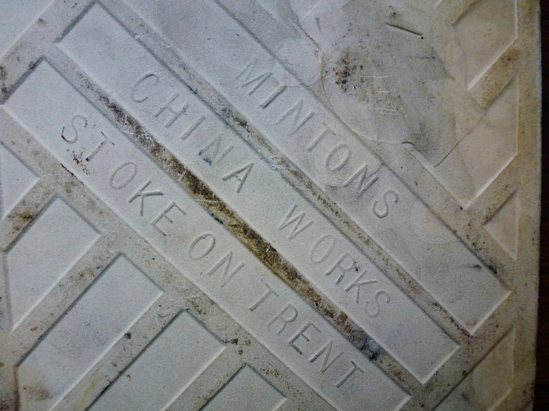 minton tile with caduceus