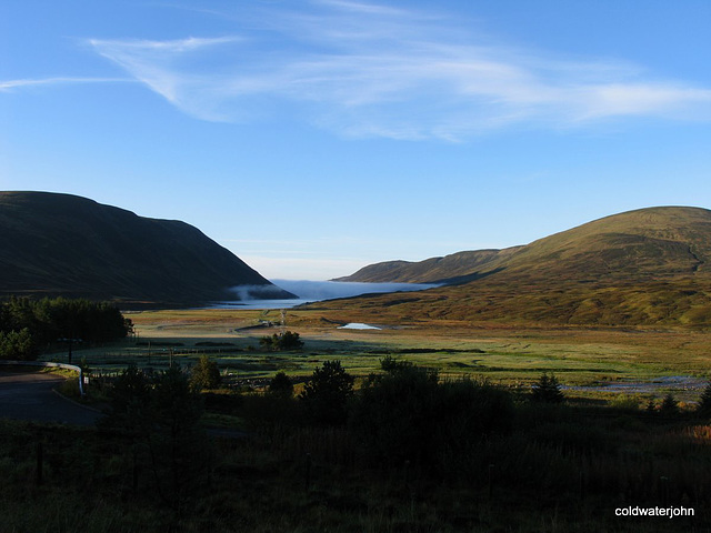 Dawn at Dalnaspidal with mist over Loch Garry